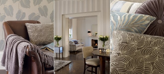 Beyaz ve eskitilmiş siyah mobilyalarla dekore edilmiş bir oda