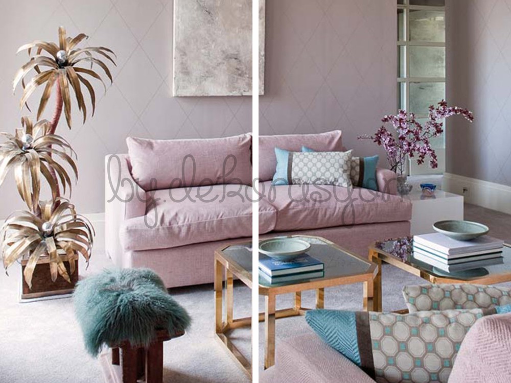 Farklı pastel renklerde yastıklarla dekore edilmiş gri koltuk