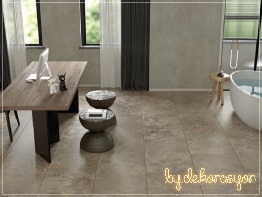 Qua Granite'in doğal taş desenli seramiklerinin kullanıldığı modern bir mekan